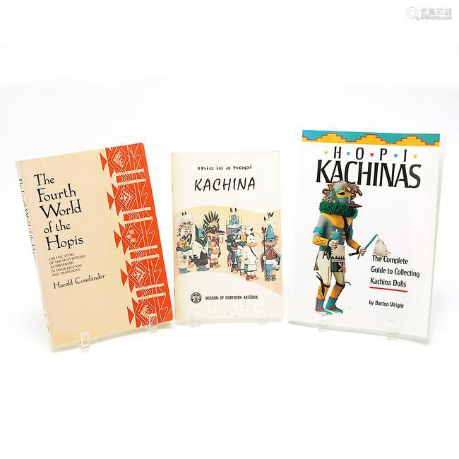 lot of four kacina dolls with related literature.