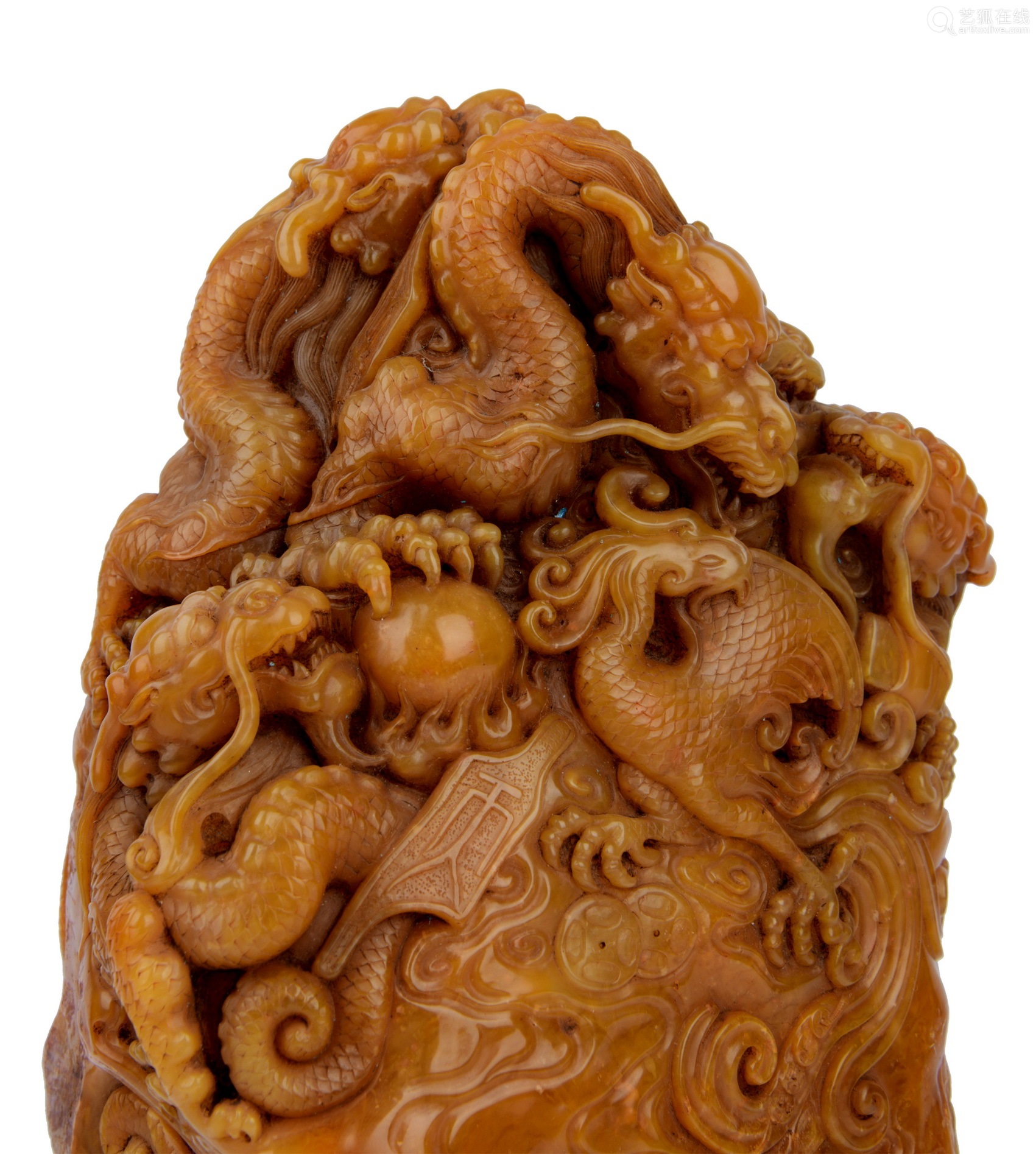intricately carved soapstone dragons on mountain