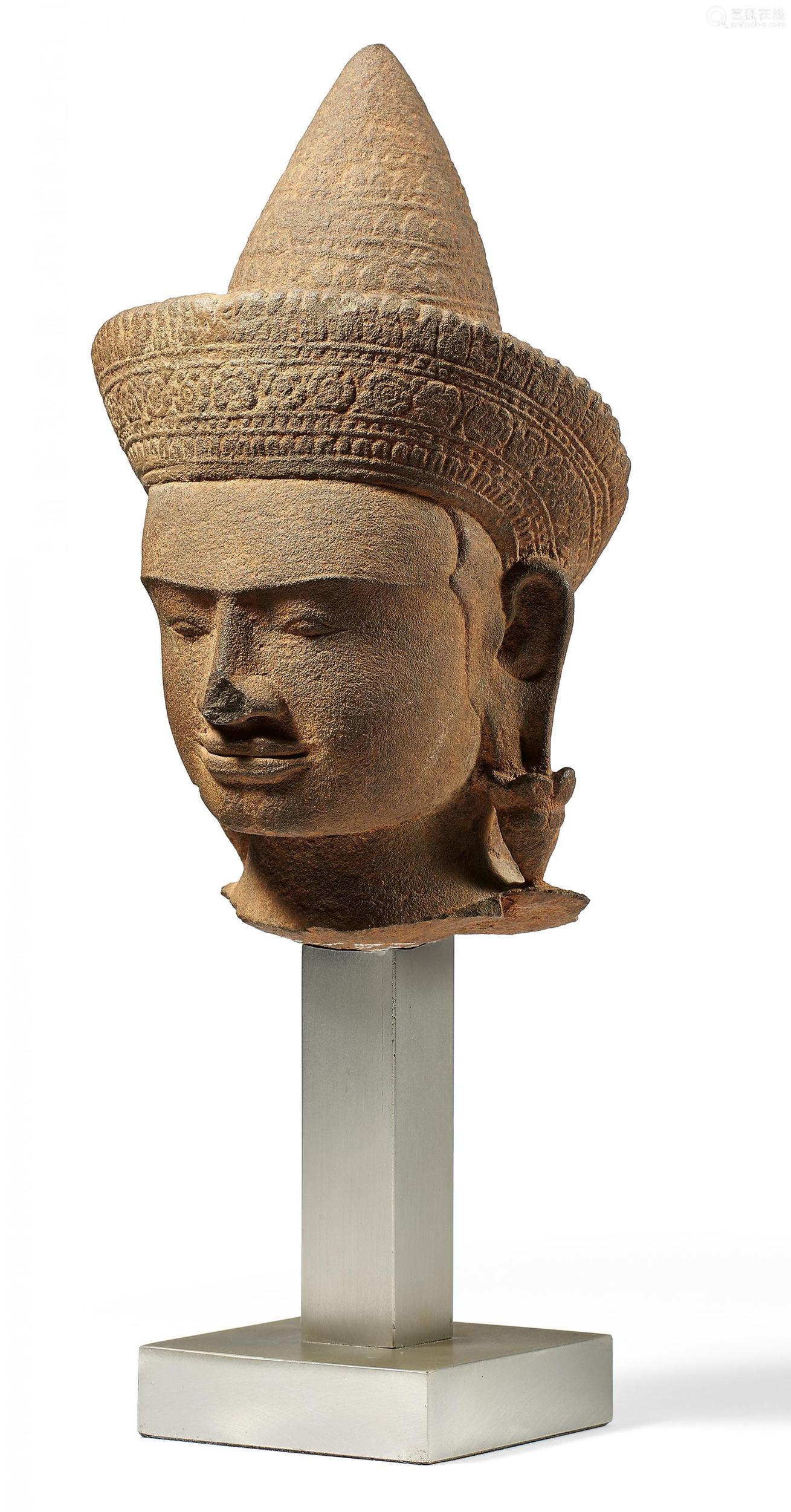 head of a crowned goddess. origin: khmer. dynasty