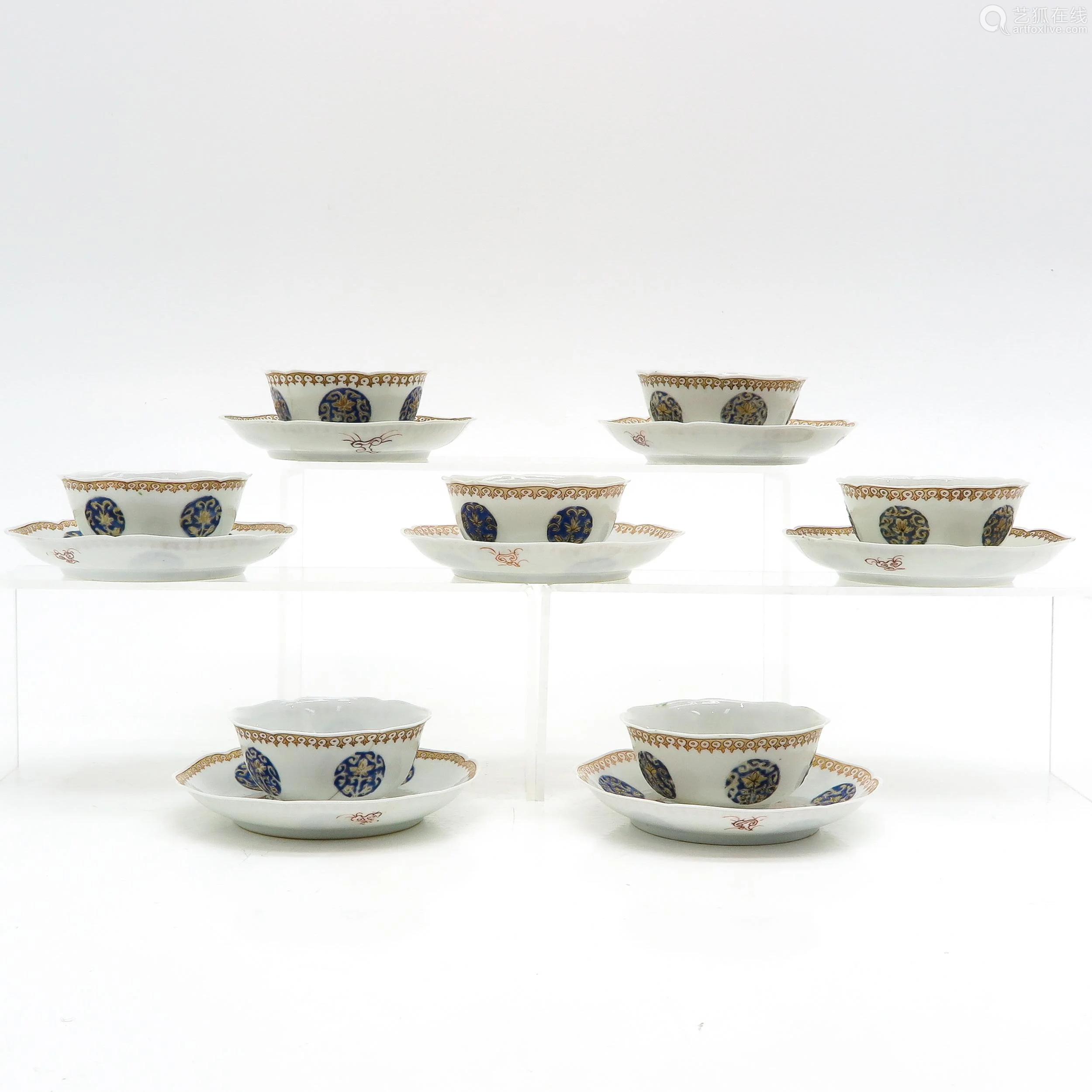 queen of cups,the hermit a collection of cups and saucers