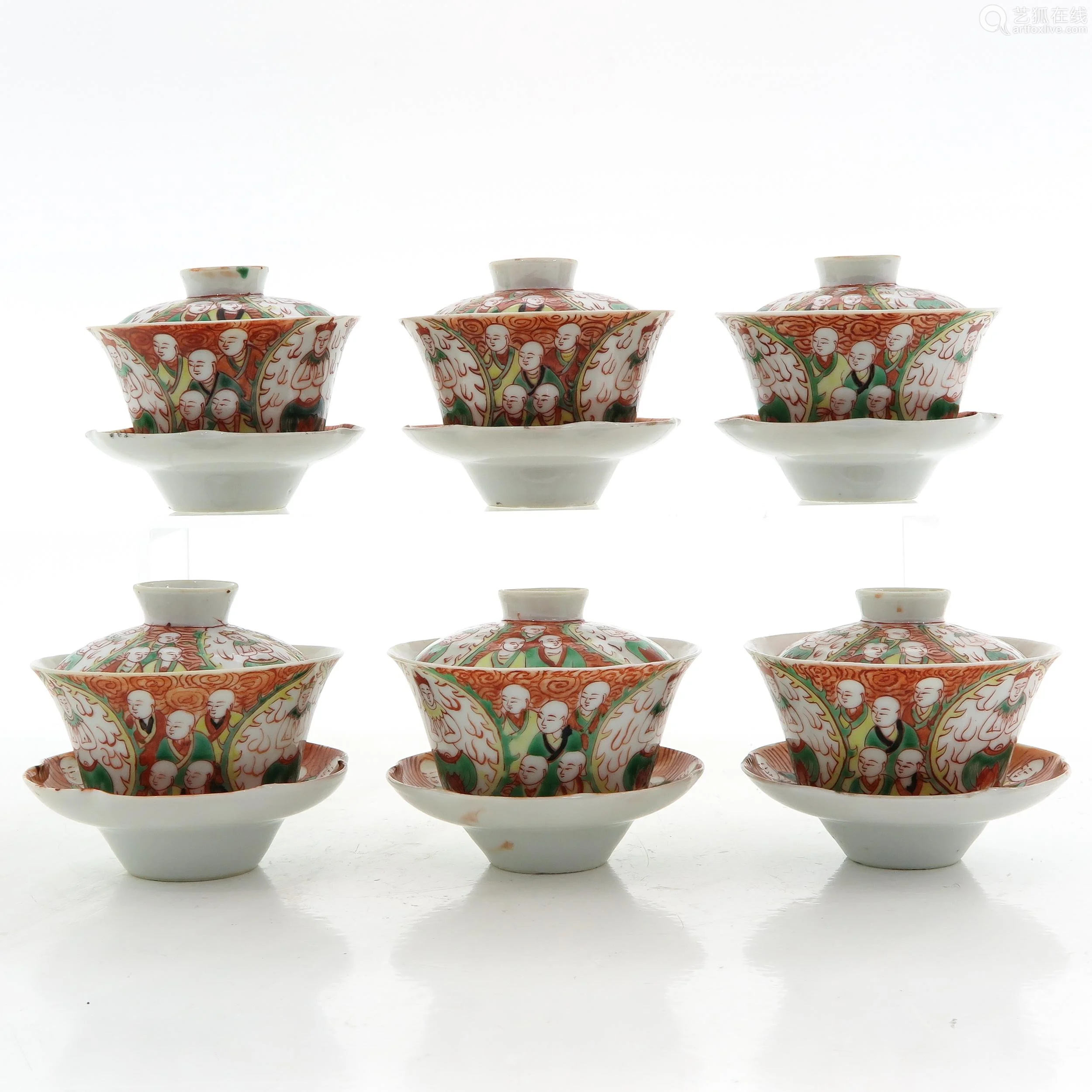 queen of cups,the hermit a collection of cups and saucers