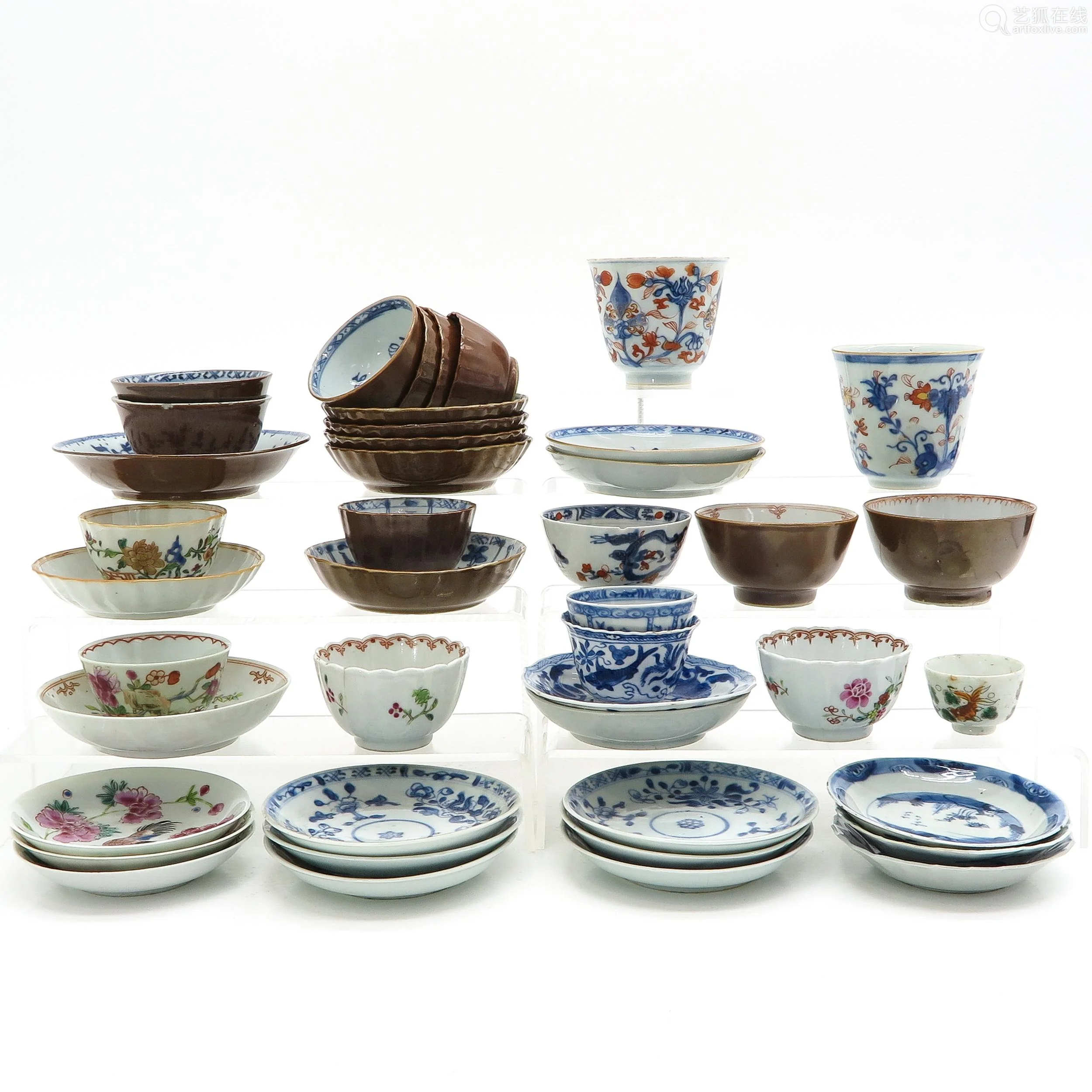 queen of cups,the hermit a collection of cups and saucers