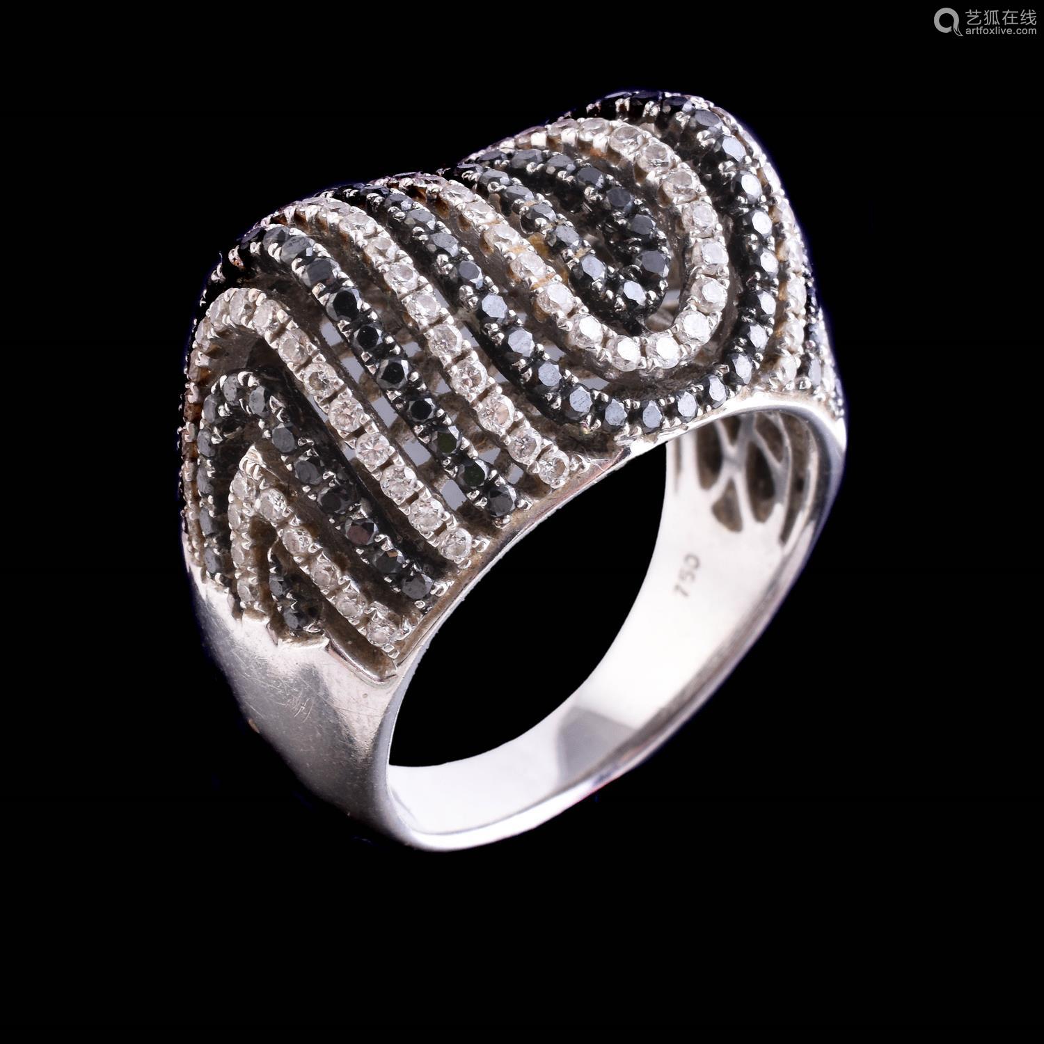 a black diamond and diamond ring