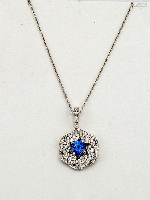 18ct white gold blue sapphire and diamond pendant necklace, the
