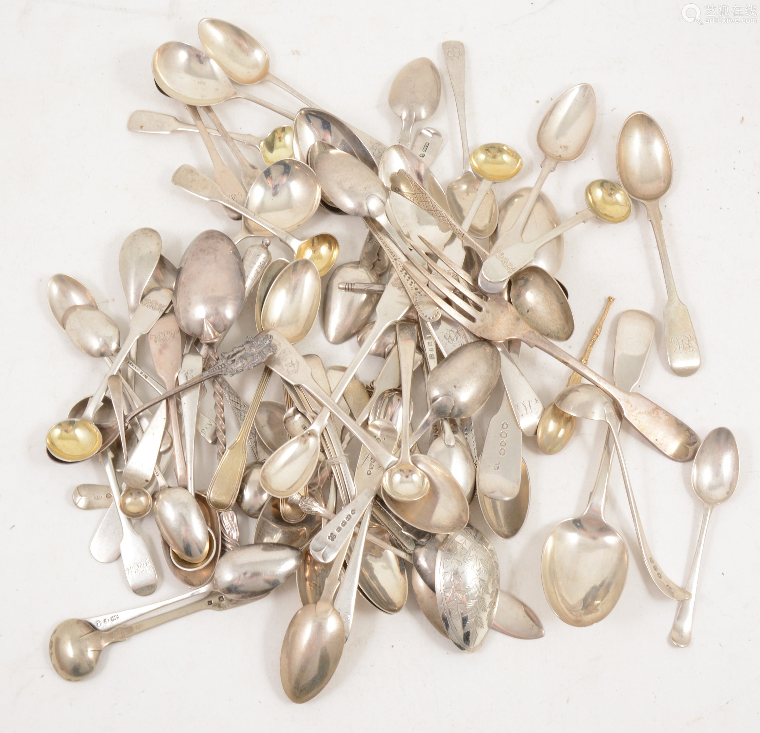 a large quantity of silver cutlery, mostly teaspoons and dessert