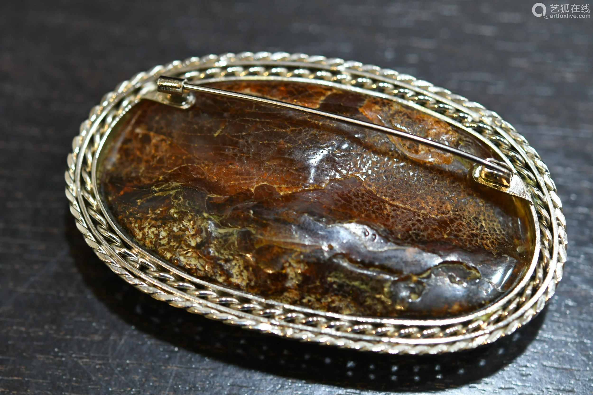 carved natural amber & silver broach