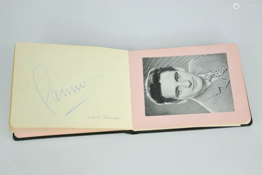 an autograph book containing many signatures including stan