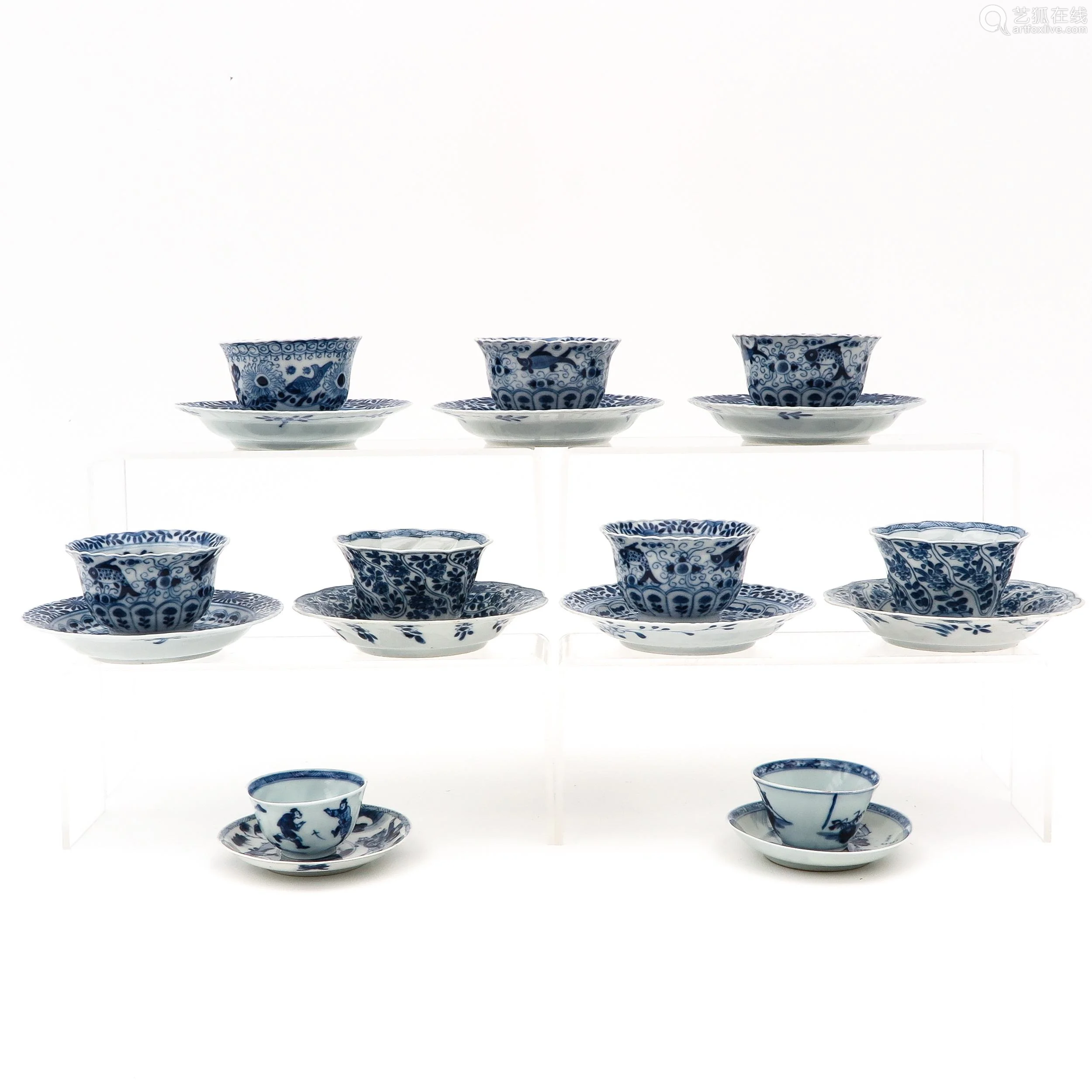 a collection of cups and saucer