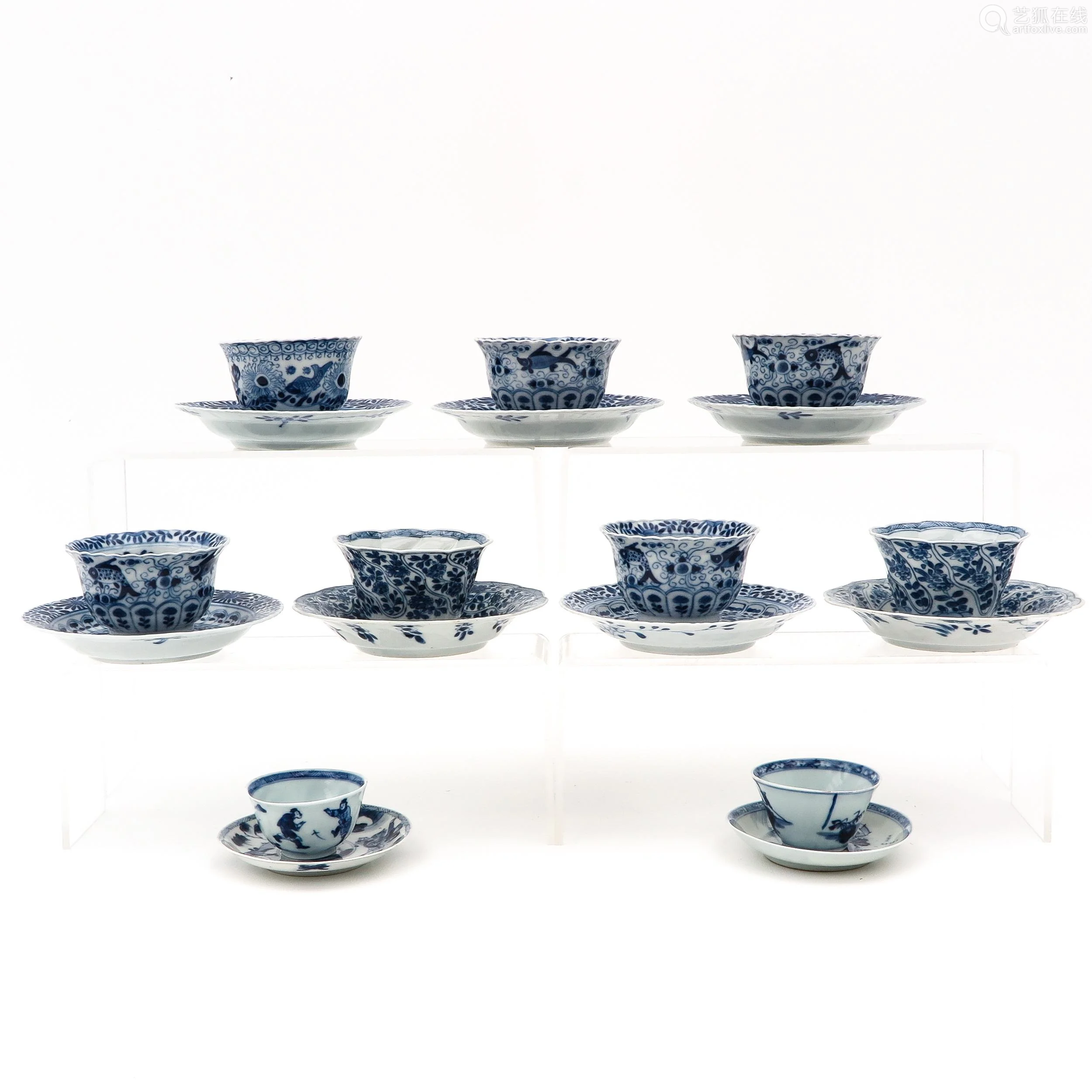 queen of cups,the hermit a collection of cups and saucer