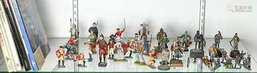 Four shelves of toy soldiers, including Traditional