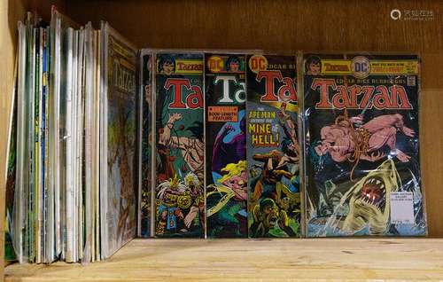 One shelf of Tarzan DC comic books