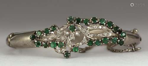 Emerald, diamond and 10k white gold bracelet