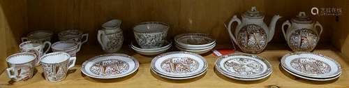 Two shelves of stoneware including