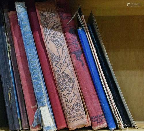 One shelf of children's books including Mammoth Story