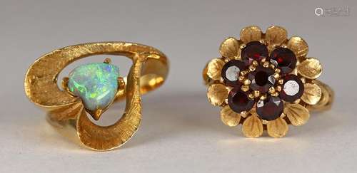 (Lot of 2) Opal, garnet and yellow gold rings