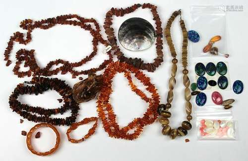 Collection of amber, unmounted stones and items