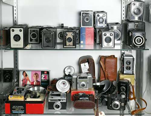 Two shelves of Agfa Ansco cameras and products