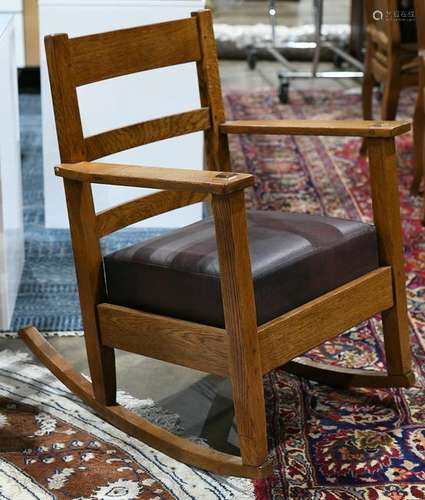 Arts and Crafts quarter sawn oak rocking chair, having