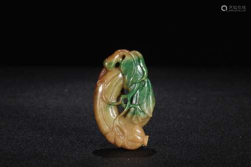 A Chinese Carved Jadeite Pendant