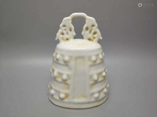 A Chinese White Glazed Porcelain Bell
