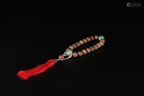 A Chinese Carved Agarwood Prayer Beads