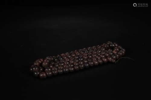 A Chinese Carved Agarwood Prayer Beads