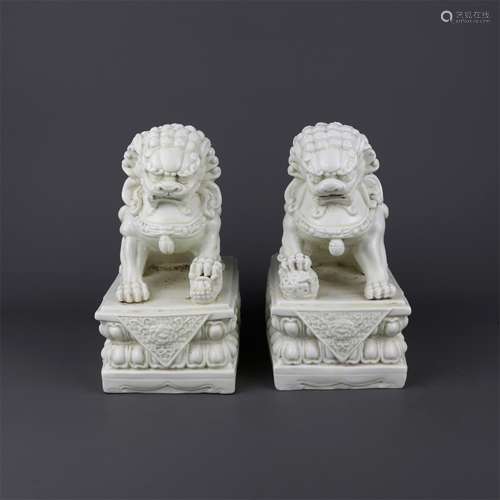 A Pair of Chinese White Glazed porcelain Lions