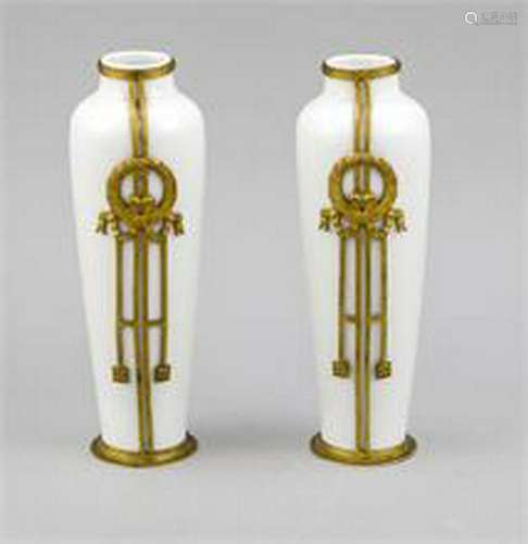 A pair of Empire vases, c. 1810, white porcelain in a