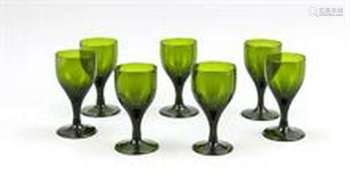 Seven wine glasses, mid-19th century, round, slightly