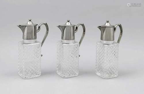 Three carafes, probably England, 20th cent., hinged