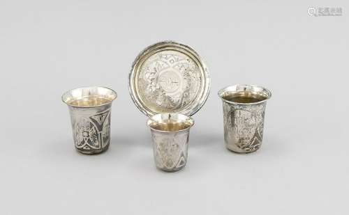 Three beakers and a trivet, marked Russia, around 1900,