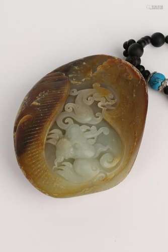 Finely Carved Jade Pendant