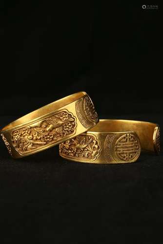 A Pair Of Gilt Silver Bangle