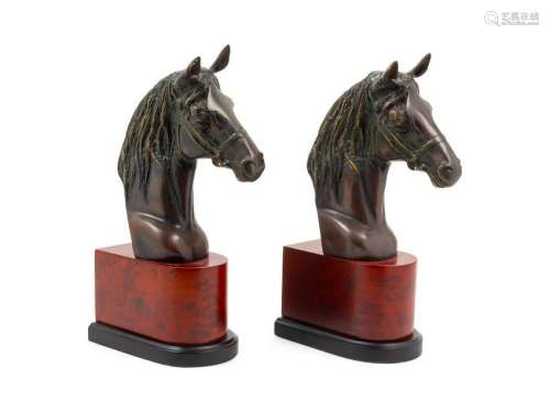 A Pair of Cast Metal Busts of Horses Height 12