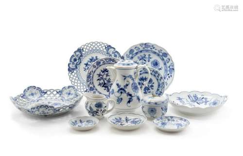 An Assembled Collection of German Porcelain Dinne