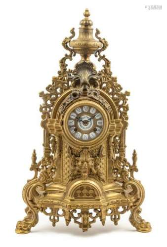 A Continental Neoclassical Brass Mantel Clock