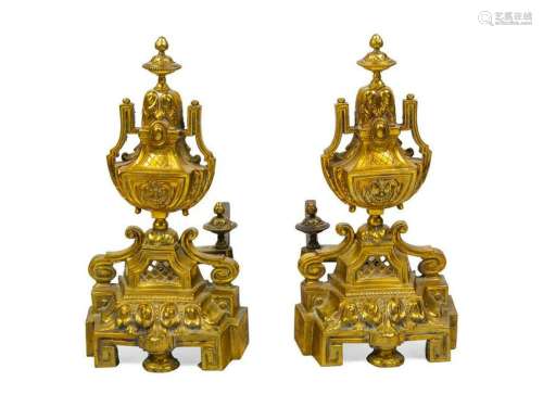 A Pair of Brass Andirons together with two fir