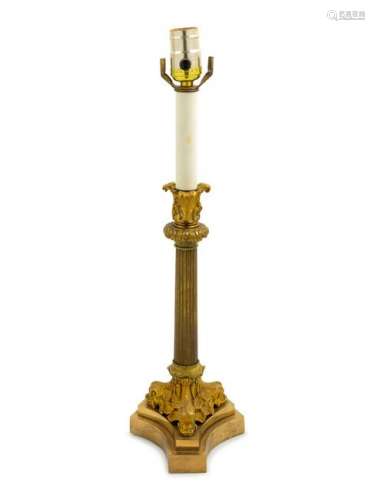 An Empire Style Gilt Bronze Candlestick mounte