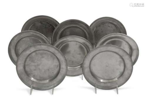 A Set of Eight Pewter Plates together with a m