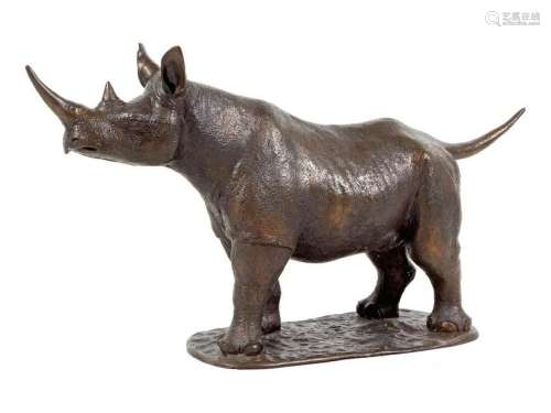 A Cast Metal Figure of a Rhinoceros Width 36 i