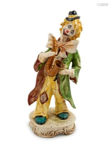 An Italian Ceramic Figure depicting a clown wi