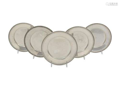 A Set of Twelve American Silver Butter Pats Di