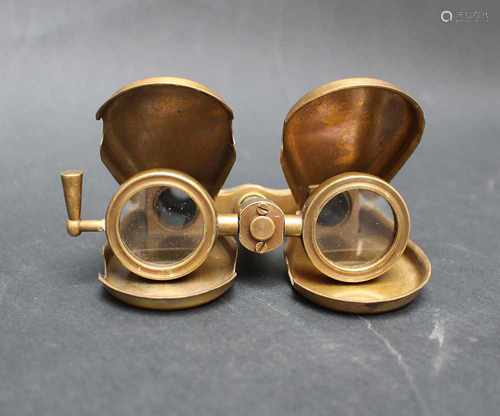 A pocket binocular, bronze, 20.century10cmThis is a timed auction on our German portal lot-tissimo.