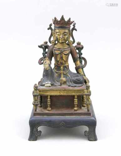 Figur der Tara Postament, China, wohl Ming-zeitlich. Bronze vergoldet und polychromstaffiert (ber.).