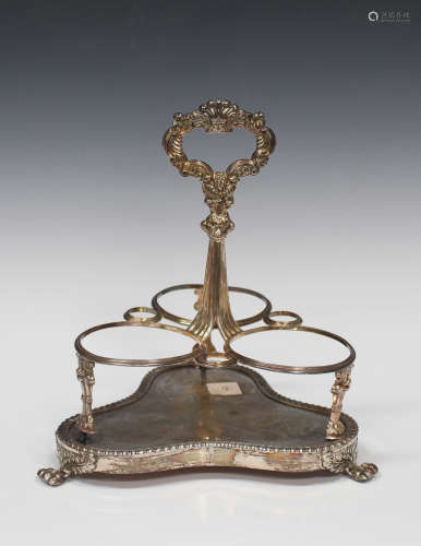 A George IV silver three-bottle decanter stand, the central handle decorated with 'C' scrolls and