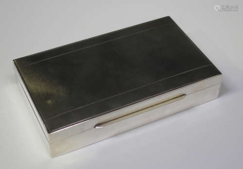 A Continental .835 silver rectangular cigarette box with engine turned decoration, length 15.2cm.