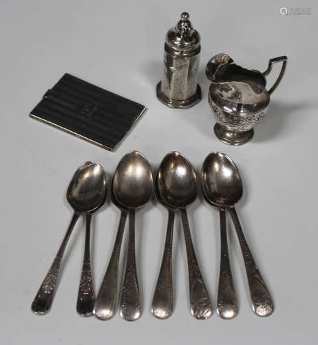 A small group of silver items, including a rectangular aide-mémoire with engine turned decoration,
