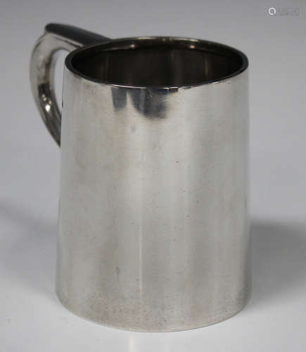 A George VI silver christening tankard of tapering cylindrical form with scroll handle, Birmingham