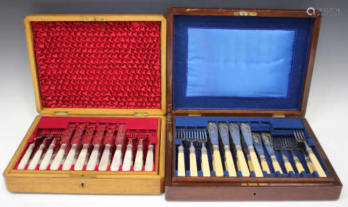 A set of twelve Edwardian plated and mother-of-pearl handled fruit knives and forks, cased, together