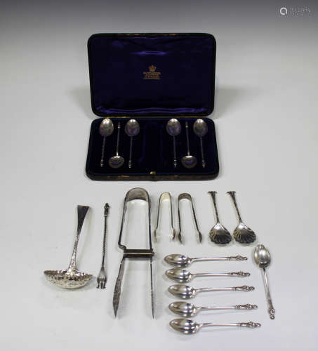 A small group of mostly silver cutlery, including a set of six Edwardian apostle teaspoons,